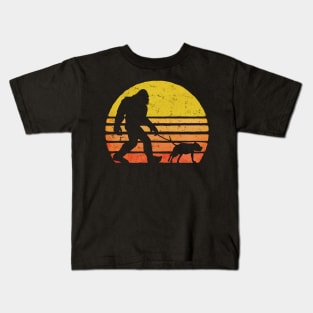 Bigfoot takes his pitbull for a walk Kids T-Shirt